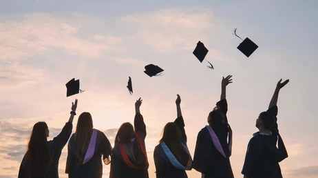 Empowered girls with graduation caps